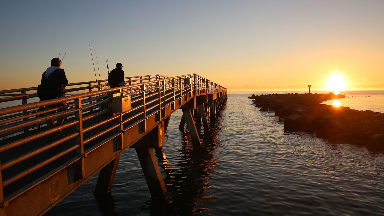 Fishers try their luck at Jetty Park Pier on Florida's Space Coast.