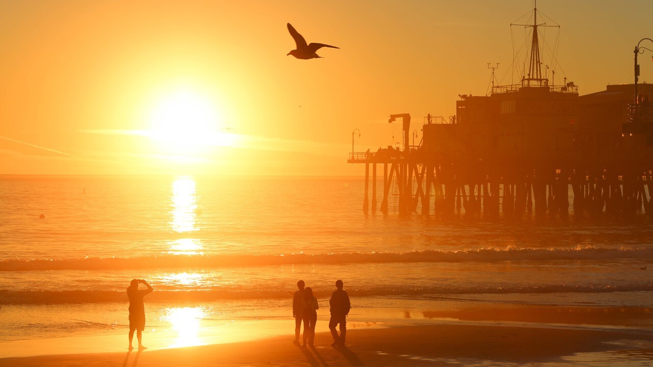 The sun sets on the Santa Monica Pier.