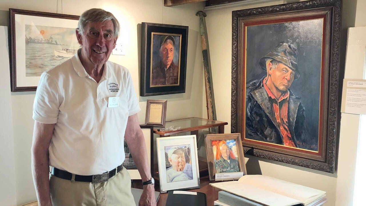 Hall Kellogg stands inside the Tilghman Watermen's Museum.