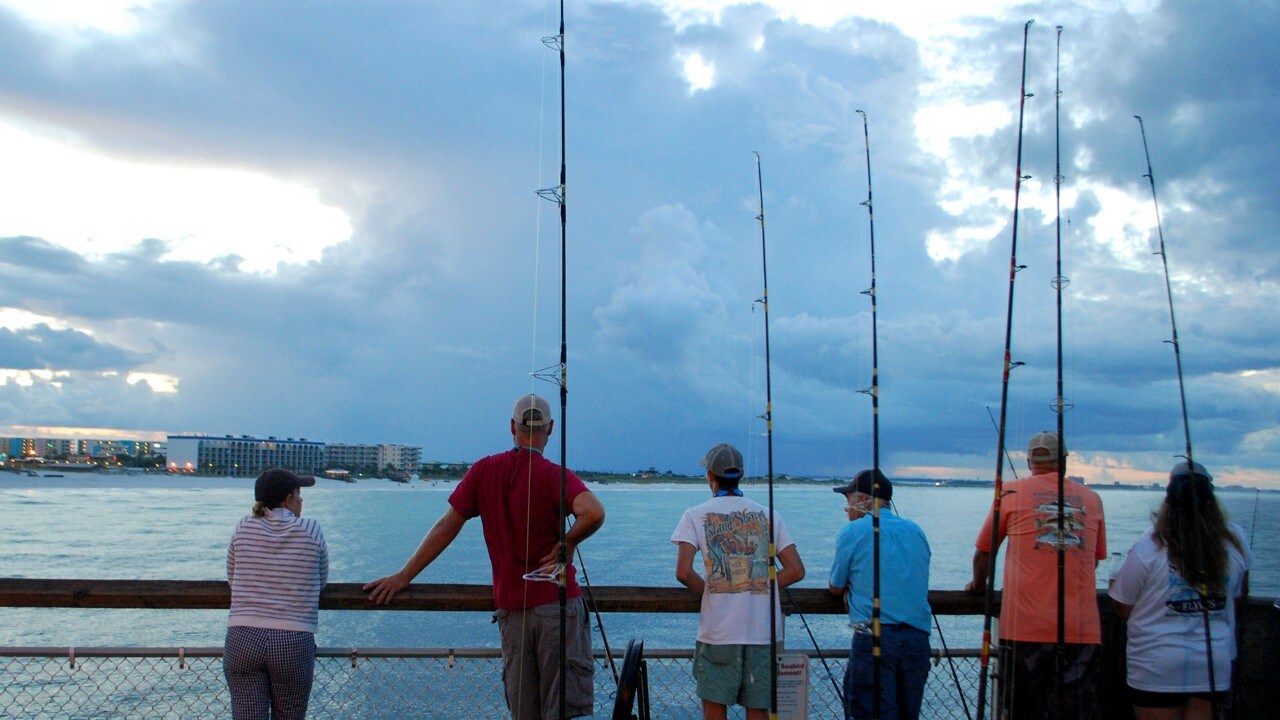 Serious fisherman at sunrise