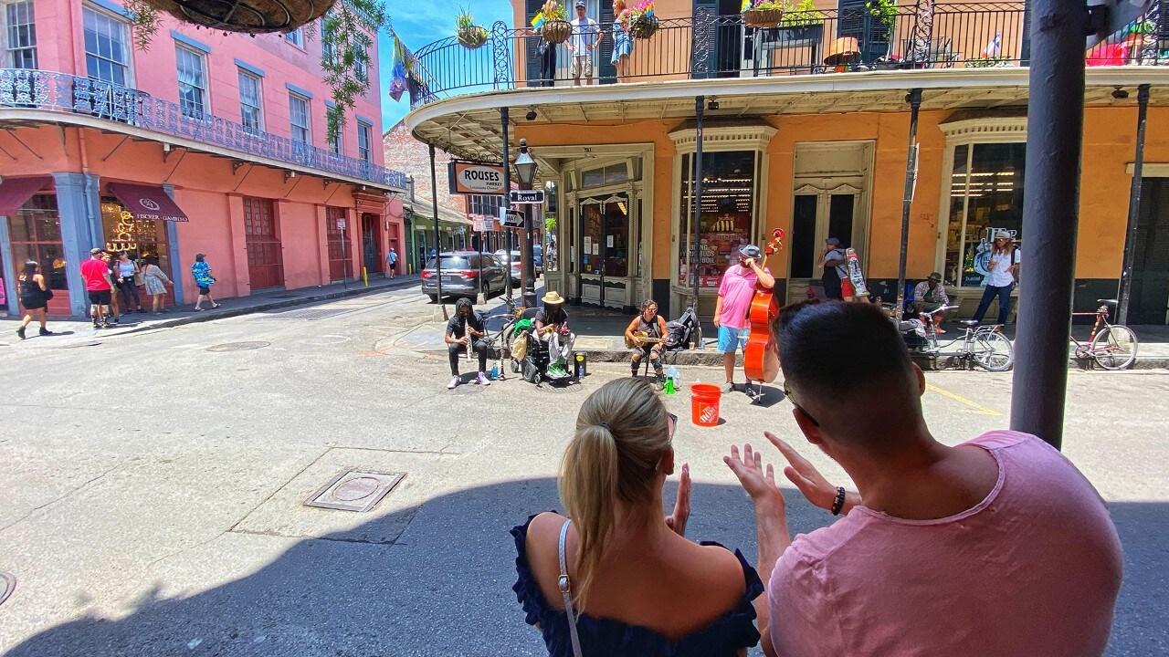 Day and night,  buskers perform along Royal Street in New Orleans' French Quarter.