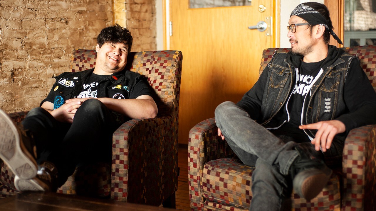 Eugene Levy frontman Brian Martinez (left) and guitarist Brian Wilson lounge inside Proof Social in Muscatine, Iowa. 