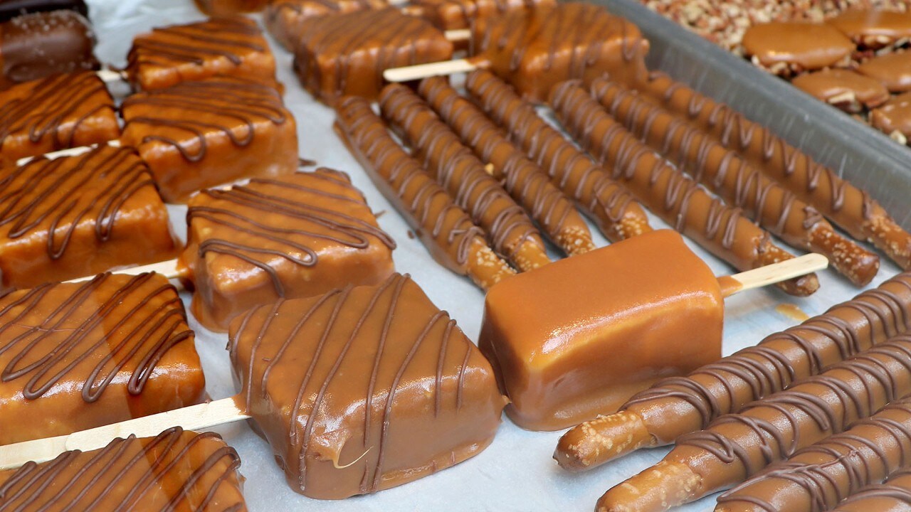 Made-in-store confections fill the front window of Kilwins in downtown Asheville.