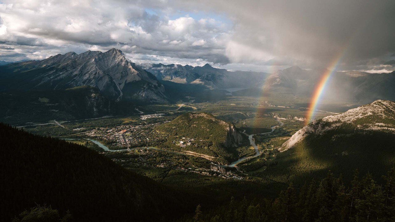 A double rainbow appears over Banff.