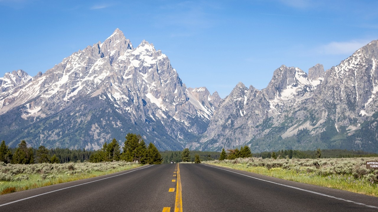 The Teton Park Road follows the base of the Teton Range.