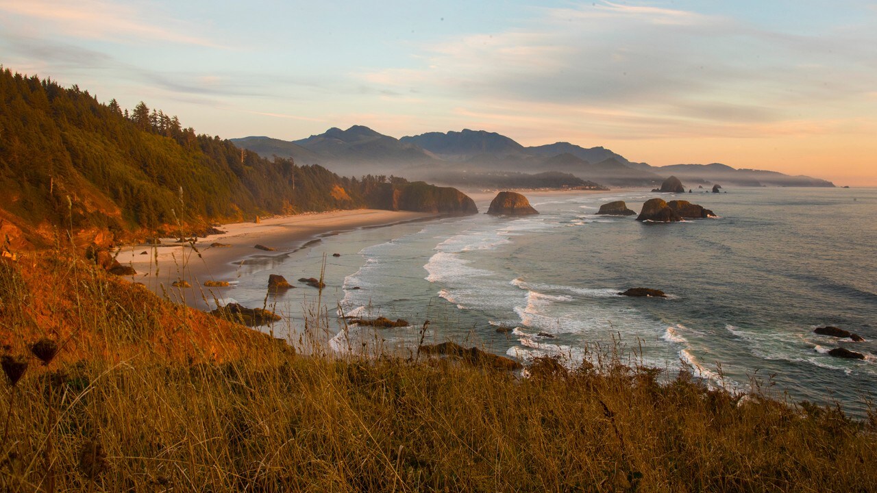 The sun sets at Cannon Beach, Oregon. 