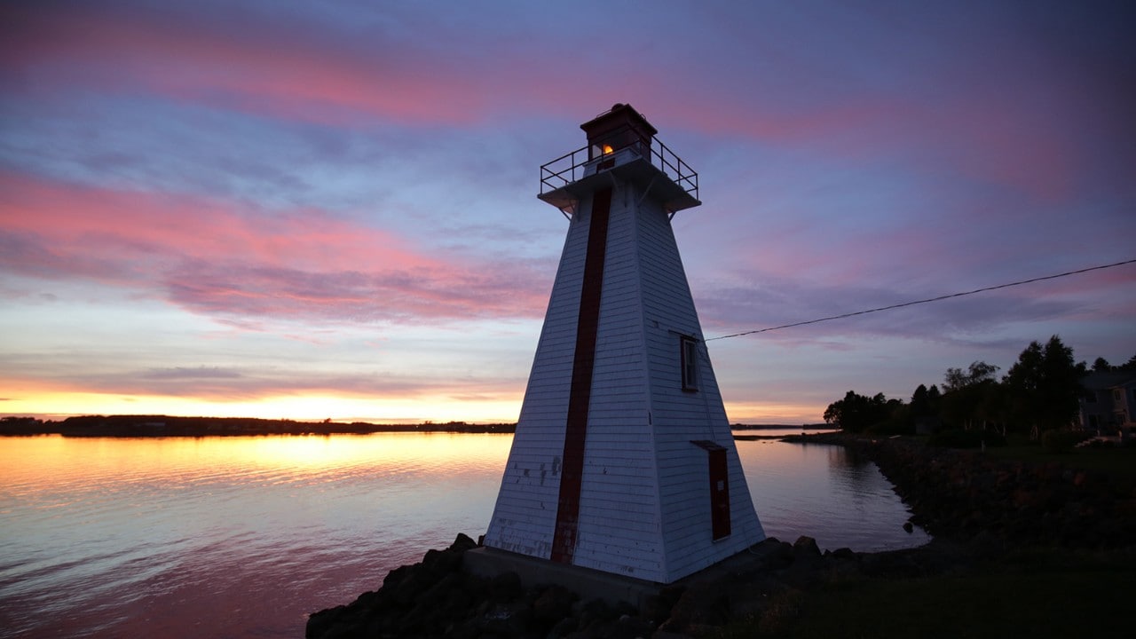 A lighthouse in Charlottetown sits on the banks of the North River.