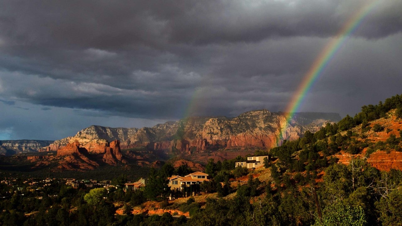 A double rainbow appears near Airport Mesa Vortex.