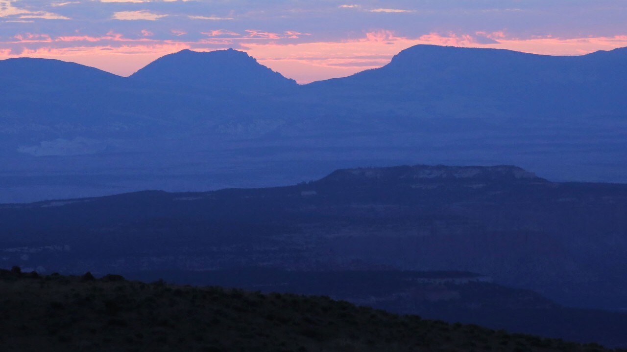 The Homestead Overlook features purple hues at sunrise.