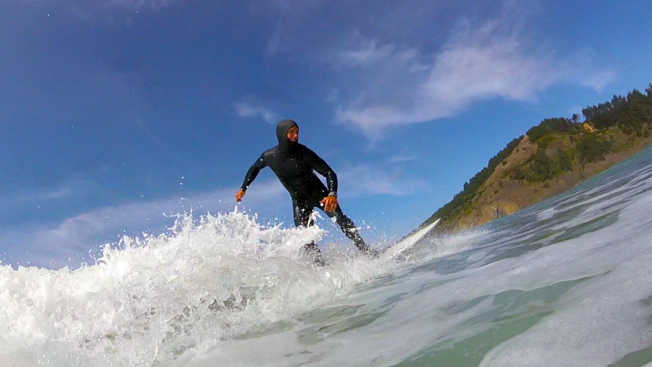 Ollie Richardson grabs a wave at Agate Beach in Newport, Oregon.