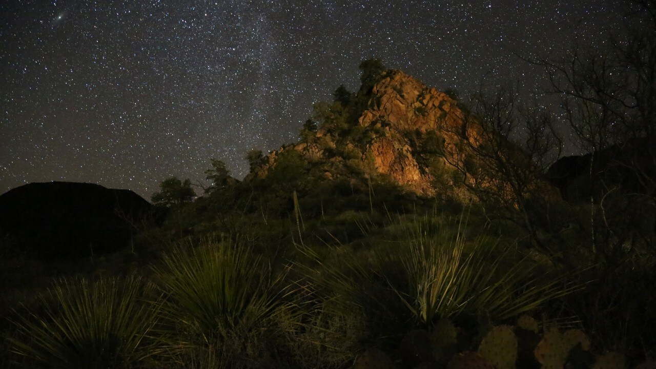 The Milky Way is visible in the dark Texas sky.