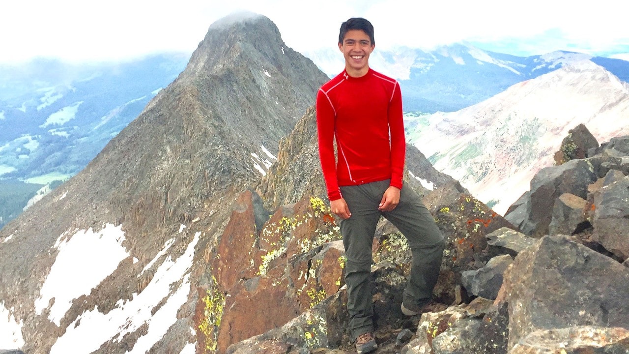 After an 11-year father-son quest, Daniel Otteman summits Mount Wilson, his 58th and final fourteener. © Scott Otteman