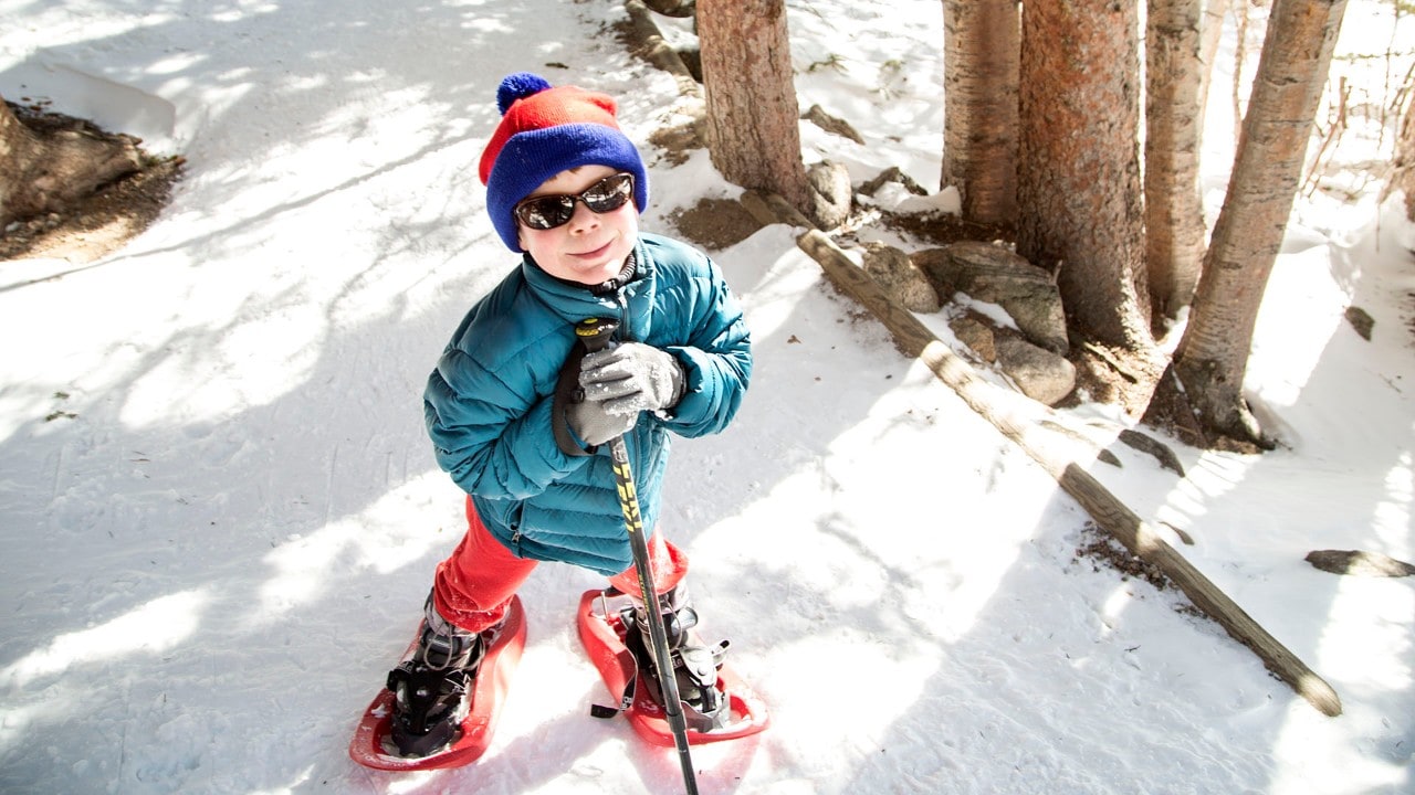 Theo likes his snowshoes.