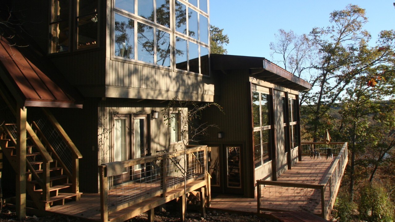 Cliff House Lodge at River of Life Farm features a wrap-around deck with spectacular views of the North Fork of the White River valley.