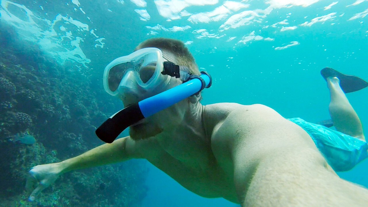 Joe snorkels along Black Rock Beach.