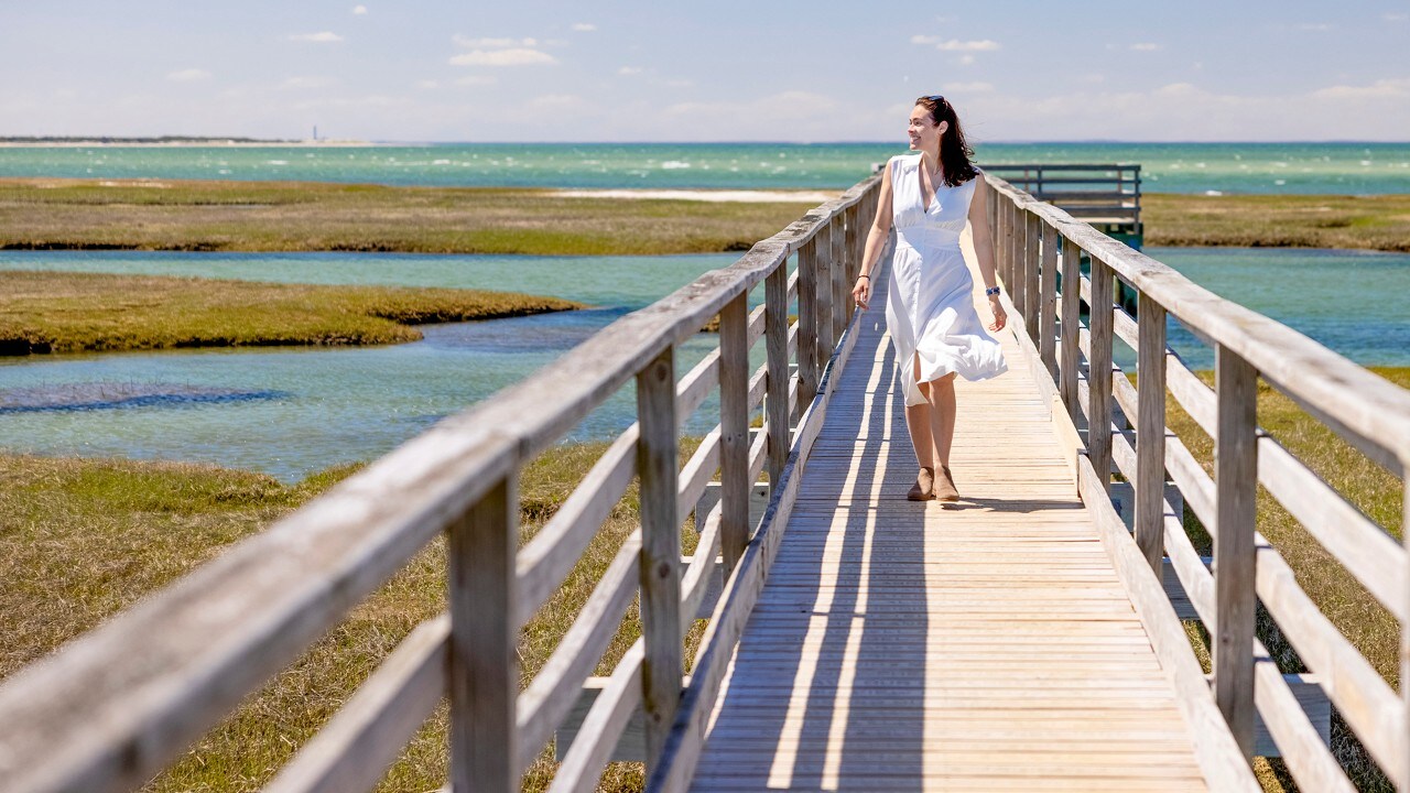 The Bass Hole Boardwalk at Yarmouth, Massachusetts, extends a quarter mile into Cape Cod Bay.