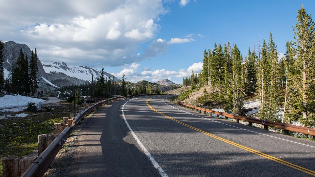 Wyoming's Snowy Range Scenic Byway takes drivers through apline tundra. Photo by Nick Cote