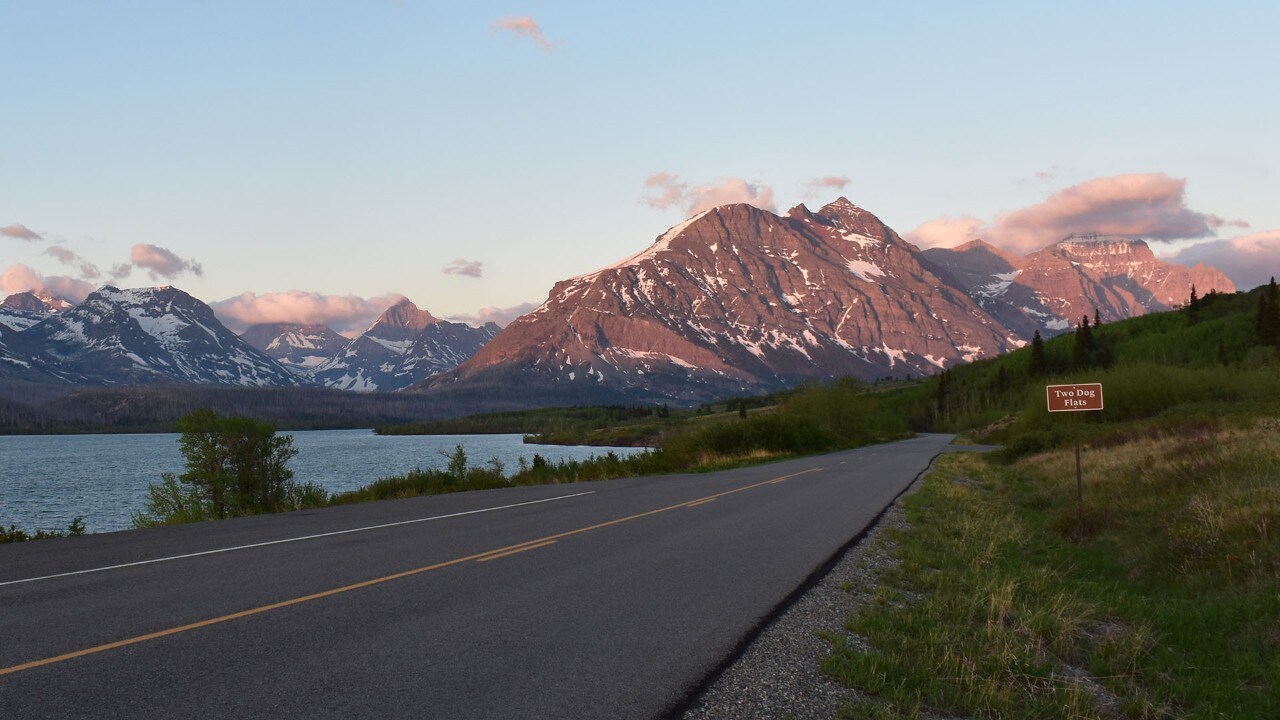 Sunrise is a picturesque time to drive the Going-to-the-Sun Road.