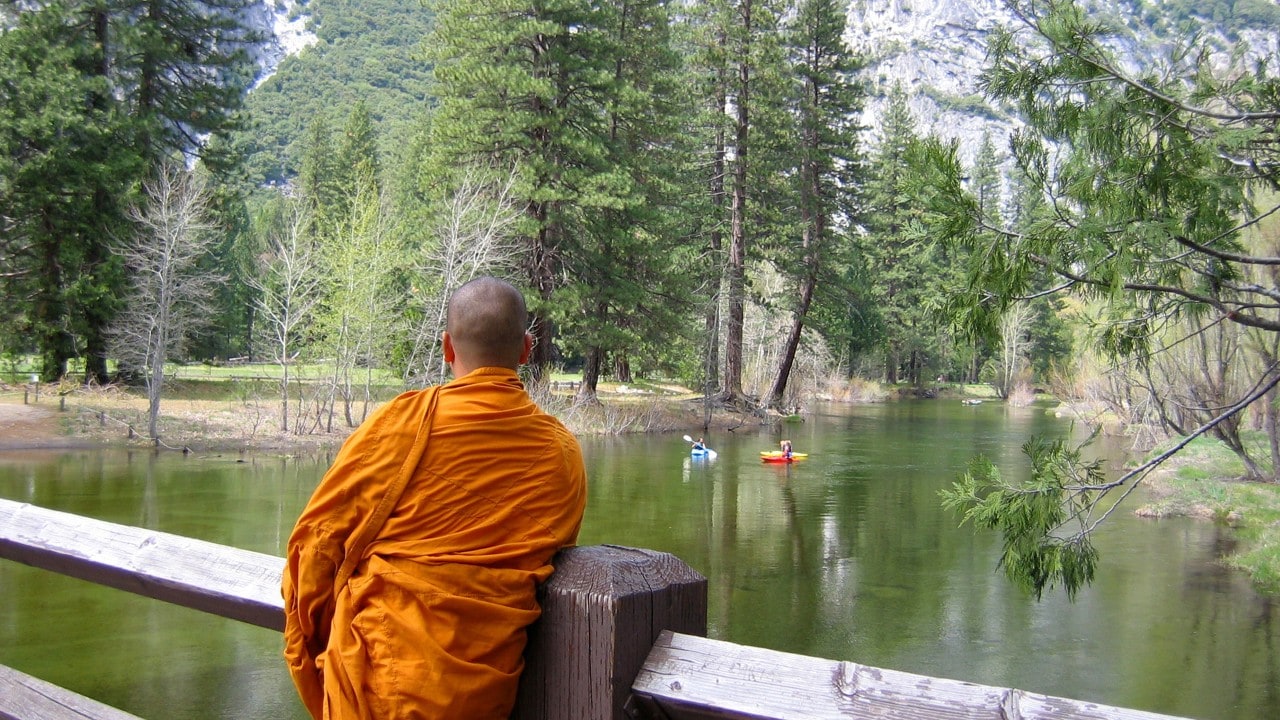 Visitors enjoy the Merced River in Yosemite National Park from different vantage points.