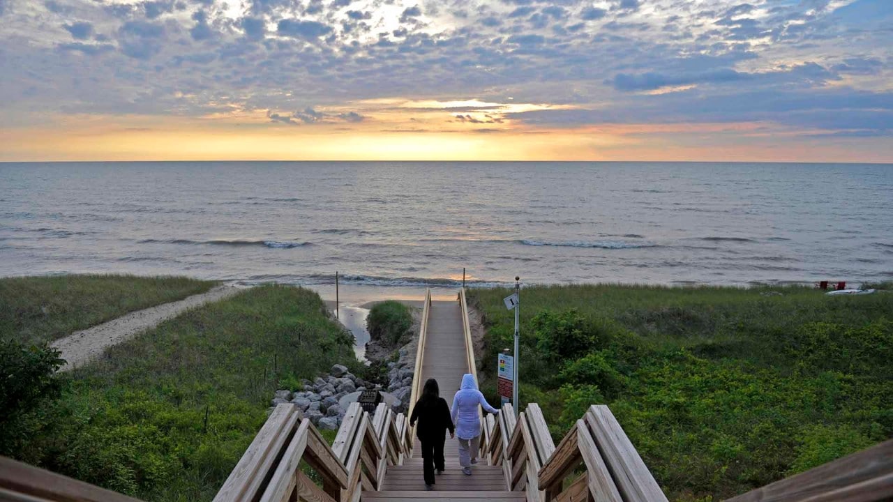 The sun sets over Lake Michigan.