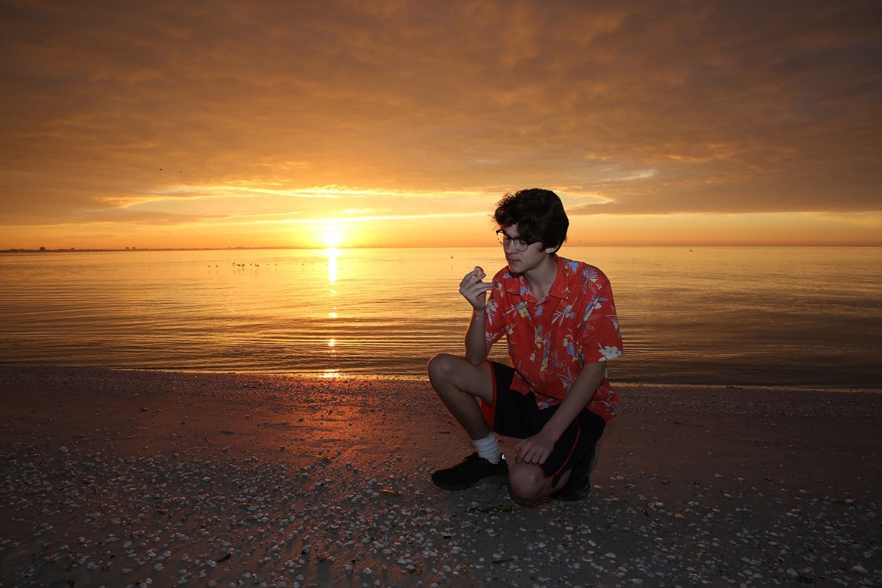 Searching for shells at sunrise