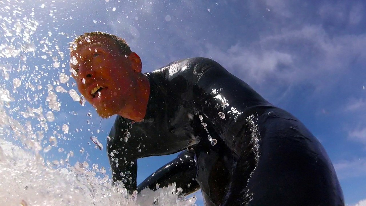 The author paddles into a wave.