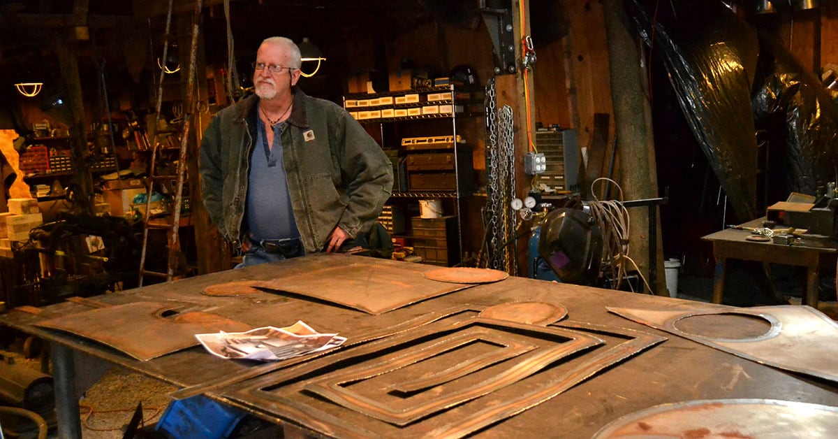 Mark Schwenk works in his Frog Valley metal shop.