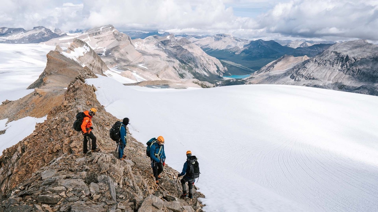 Jeremy leads students on the descent from Mount Olive.