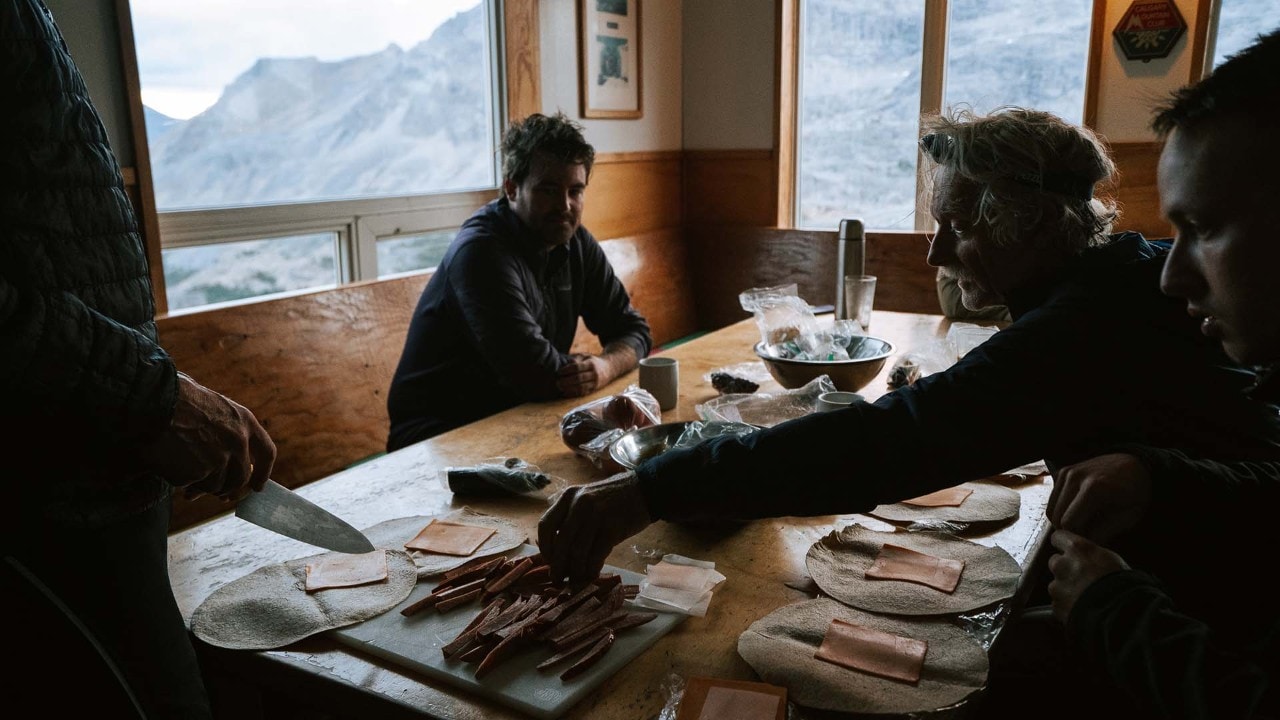 Dave prepares simple meals at Bow Hut.