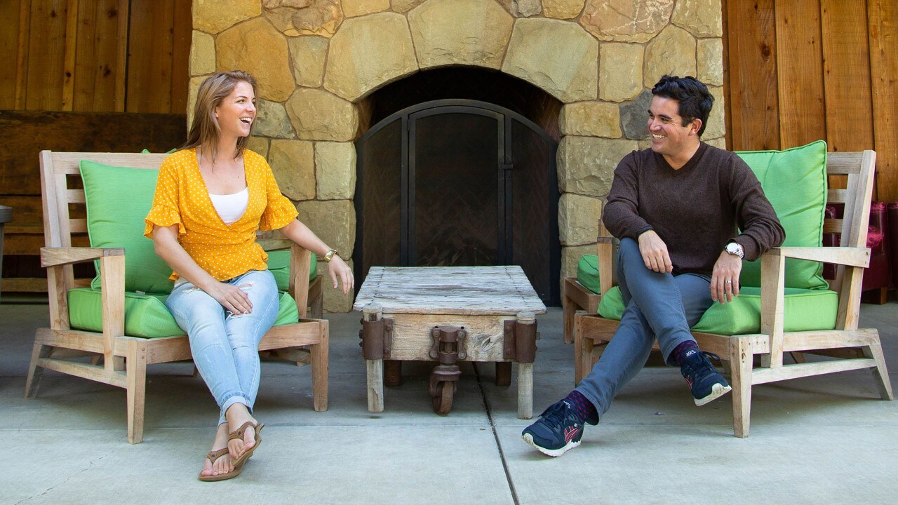 The author (left) and her friend Michael enjoy the patio at Roblar Winery and Vineyards.