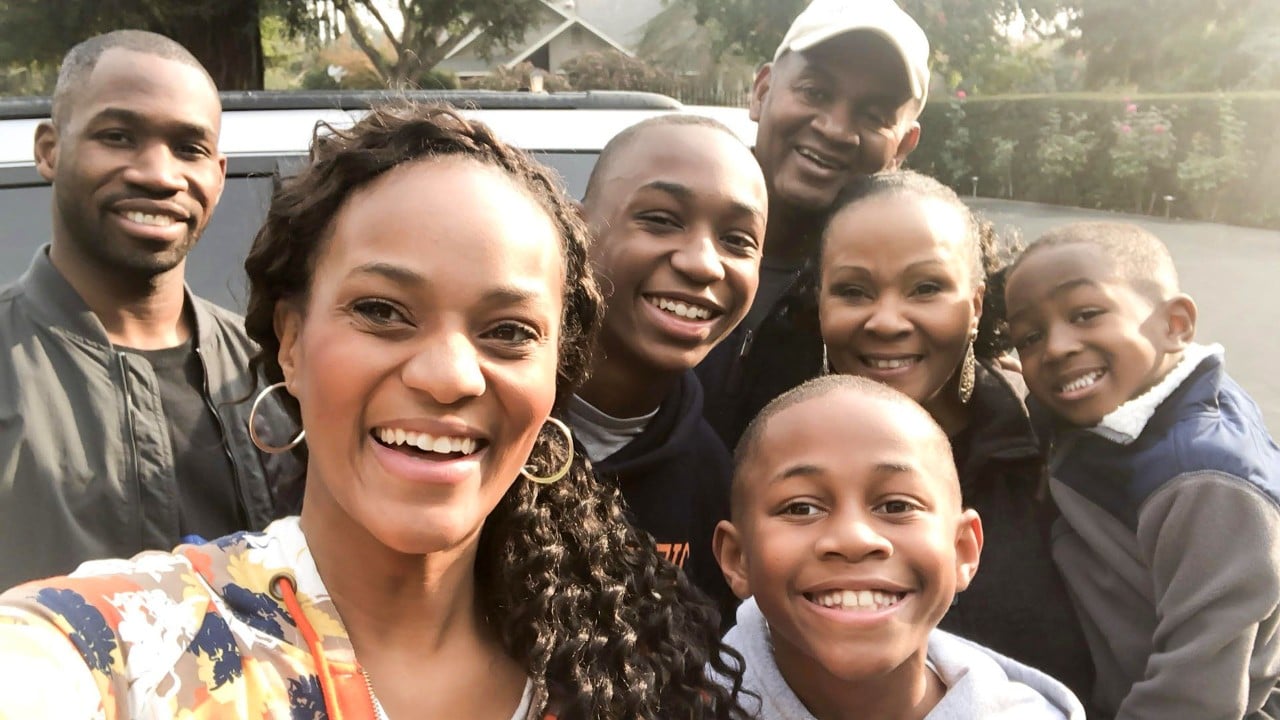 The author (second from left) and her family prepare to leave on a road trip from Fresno to San Diego.